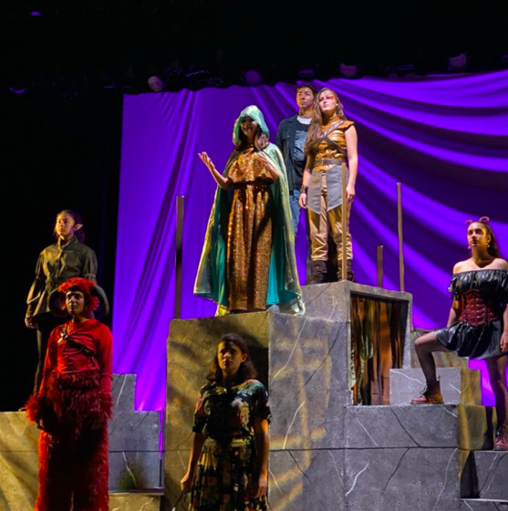 From left to right: Elizabeth Holm (‘21), Neal Mehta (‘21), Sydney Gerlach (‘20), Novalyne Petreikis (‘23), Joseph Aguilar (‘22),  Maddie Ishayik (‘23), and Delilah Delgado (‘21) all stand on stage during the closing scene of the Bishop's fall play: She Kills Monsters 

(Photo courtesy of the Bishop’s School Instagram)
