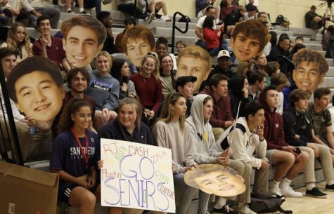 Bishop’s fans and spectators sat in the stands, engrossed in the game. Many held posters celebrating the seniors, a common tradition during Senior Night games. 
Photo courtesy of the Bishop’s Athletics Instagram (@bishops_athletics)