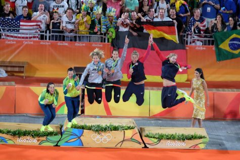 This is what the Olympics should be all
about: athletes from different countries
coming together to not only compete and
bring pride to their nation but have fun and
enjoy each other’s company. Pictured are
the beach volleyball medalists at the 2016
Rio Summer Games.