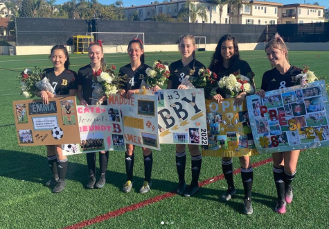 The teams underclassmen honored their seniors with flowers and thoughtfully decorated posters before their game against Escondido Charter.