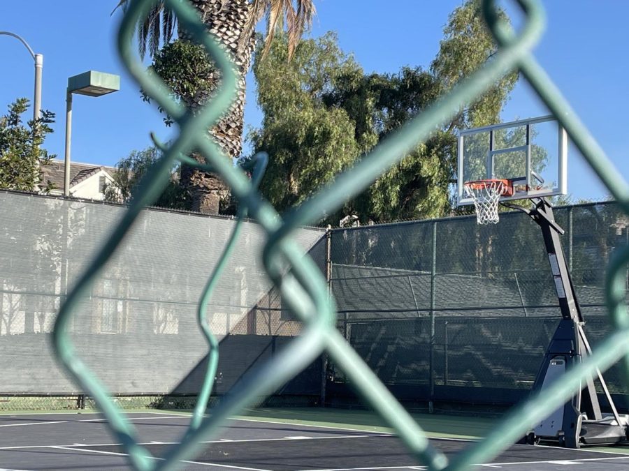 On the outdoor basketball court, a rope  was found fashioned in a manner reminiscent of a noose.