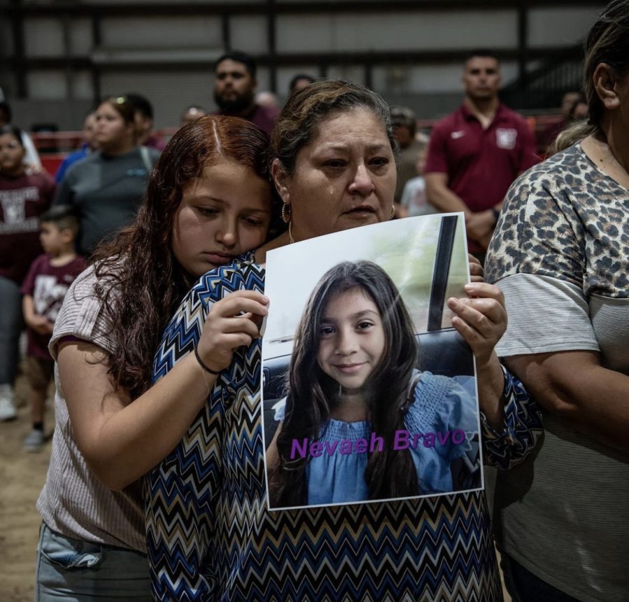 Mother+and+her+daughter+mourn+their+daughter+who+was+one+of+the+nineteen+children+killed+in+the+Uvalde+shooting.+