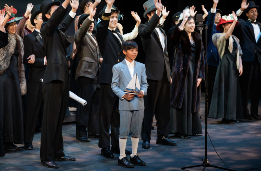 In the finale of the production, the performers waved to the audience in a final goodbye. Pictured are members of the Bishop’s Singers, Bel Canto, additional Guest Artists, and sixth grader Bodhi Landin.