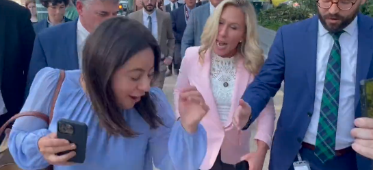In this moment from the original Twitter video, Greene can be seen using a kicking motion towards Pecoras heel, prompting outrage and confusion among viewers.