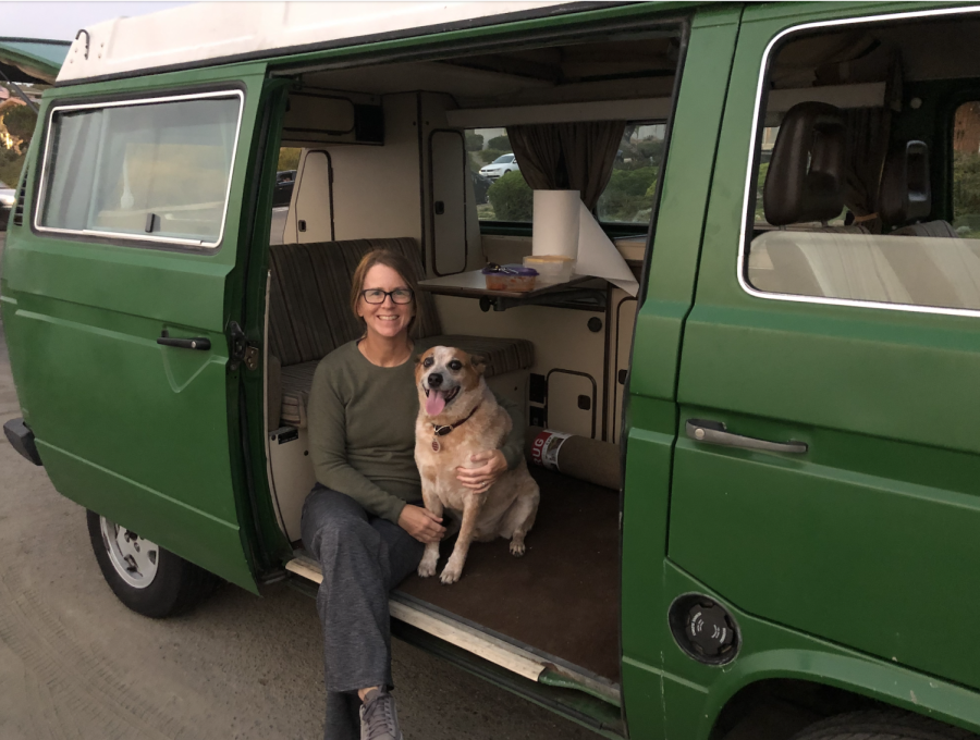 Ms. Logan and her dog Red enjoy the serene environment of Sunset Cliffs while sitting in a 1983 Vanagon Westy. Red is a red heeler Australian Cattle Dog.