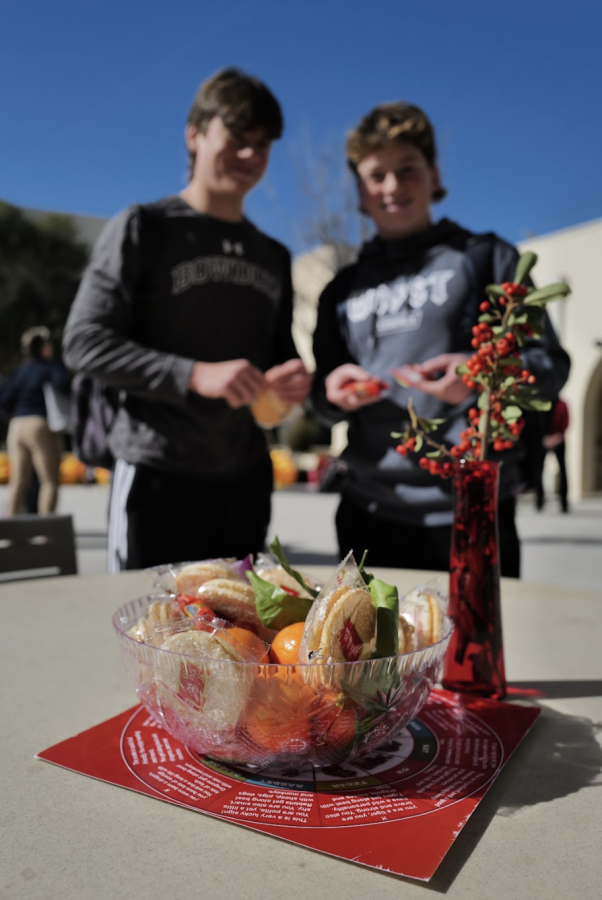 Glass bowls filled with popular Asian snacks and tangerines rested upon the dining hall terrace tables. Oranges are commonly given as food gifts during Lunar New Year, since the Chinese words for orange are similar in pronunciation to the words for luck and wealth.