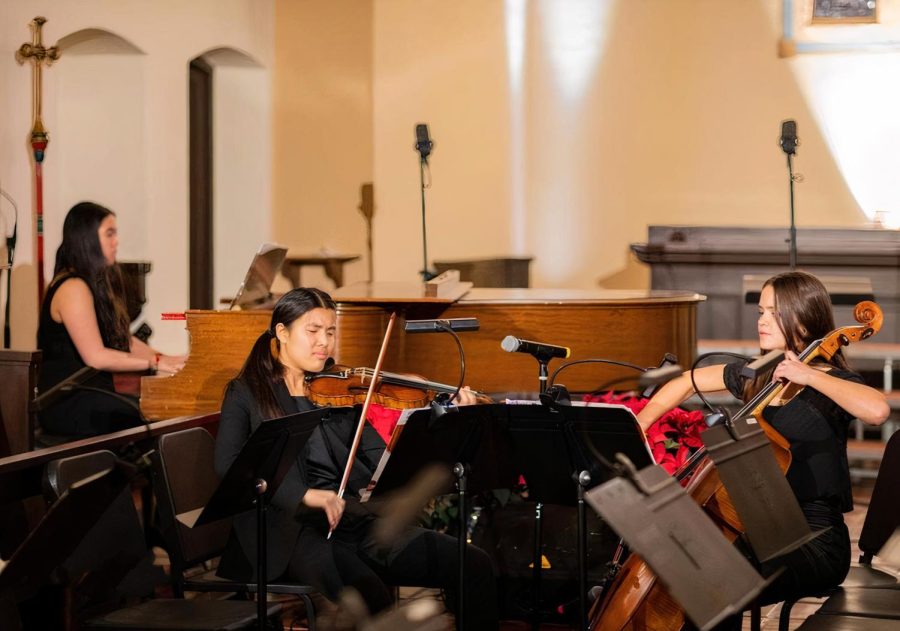Pictured are Natasha Mar (23) on the piano, Lilian Franqui (25) on the violin, and Novalyne Petreikis (23) on the Cello. 