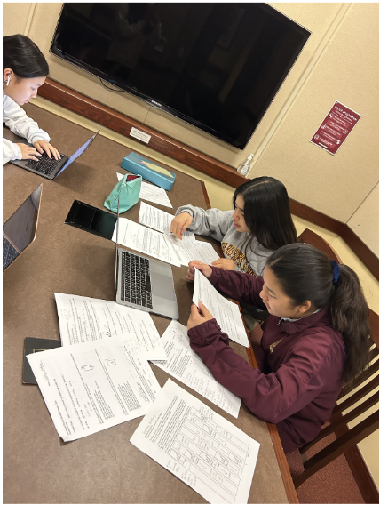 Studying for a test can be stressful on top of all of the other homework from other classes. Eleanor Meyer (‘26), Sydney Mafong (‘26), and Abigail Wei (‘26) study for their physics test during student time.