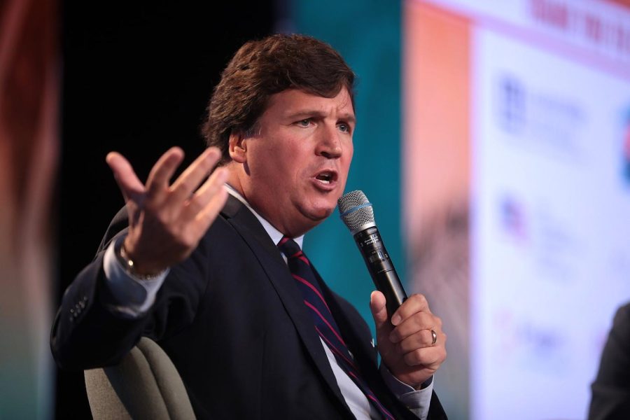 Tucker+Carlson+spoke+at+the+2018+Student+Action+Summit.+Fox+News+recently+fired+Carlson+soon+after+settling+a+defamation+lawsuit+with+Dominion+Voting+Systems.+Some+suggest+that+the+discovery+of+Carlson%E2%80%99s+texts+%E2%80%94+texts+that+criticized+conspiracy+theories+he+openly+promoted+on+his+show+%E2%80%94+led+to+the+settling+of+the+lawsuit.%0APhoto+courtesy+of+Gage+Skidmore