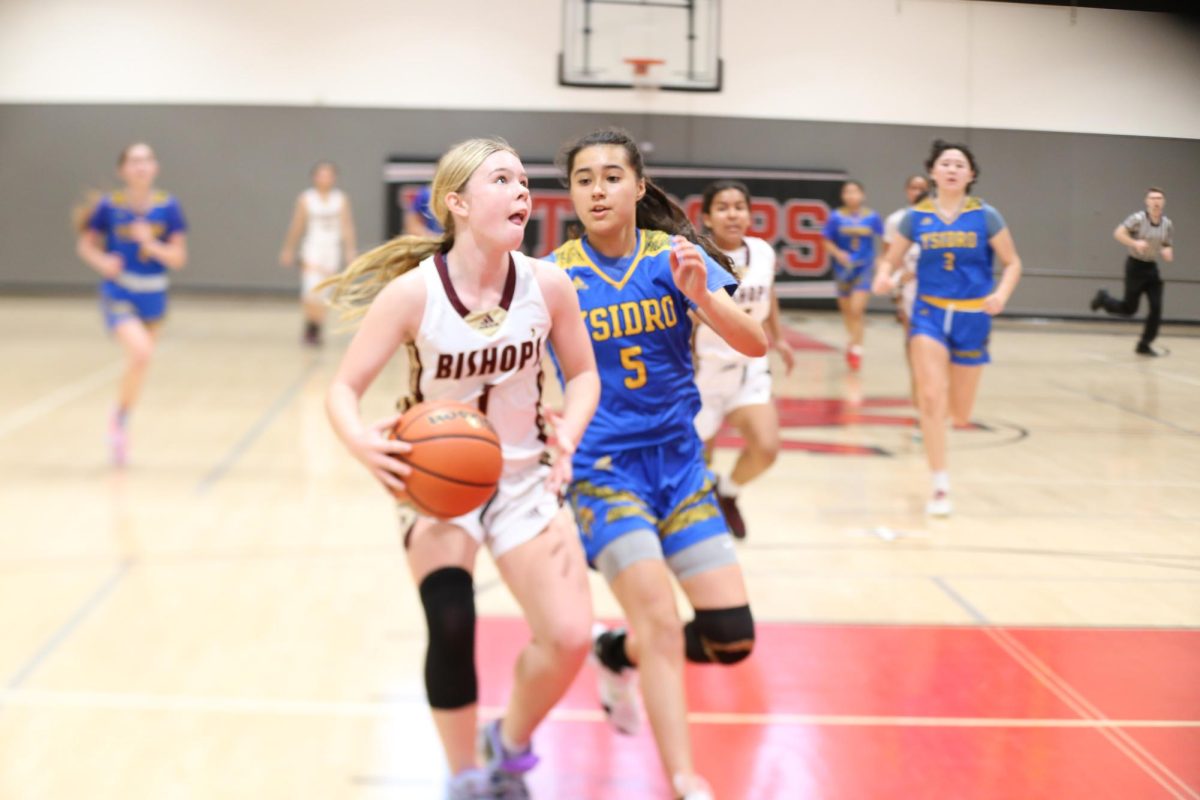 Moana Peterson (26) and the Girls’ Basketball Team were considered underdogs last season due to a slew of injuries, being a young team, and having a losing record. Next season, they’re reaching for more success.