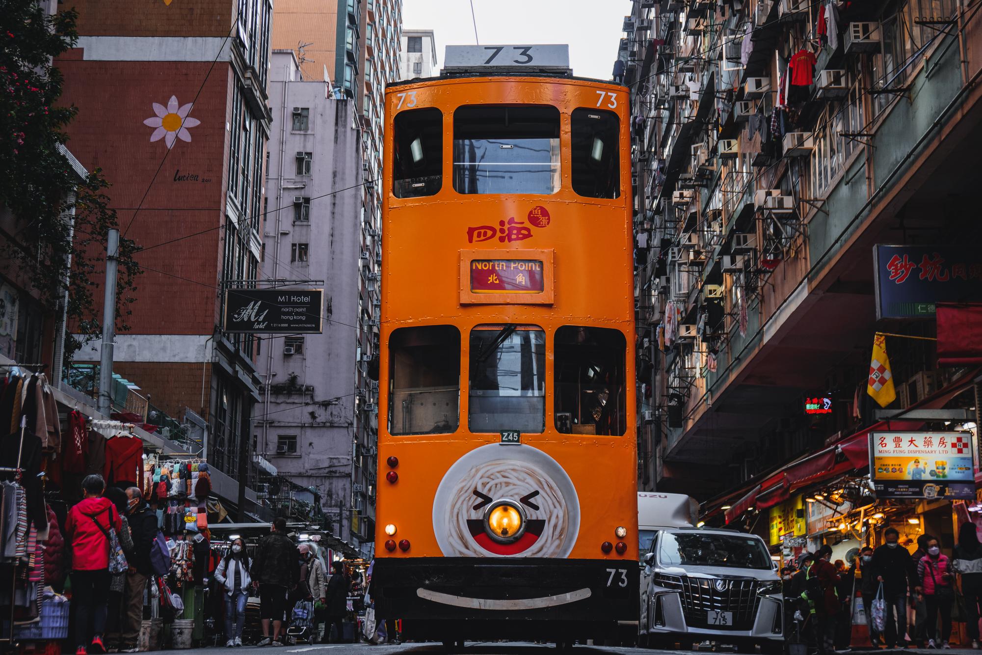 Hong Kong’s North Point tram travels down a street market on its way to North Point Terminus. Tommy Michael (25) used a Sony NEX7 with a 24-70mm lens for this shot. 
