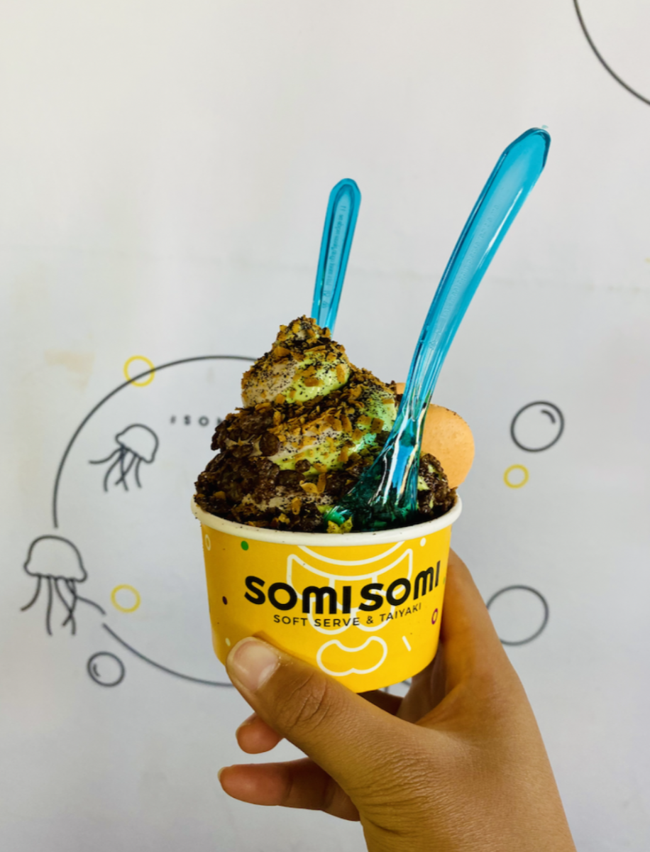 A cup of Matcha/Oreo swirl from SomiSomi: creamy and decadent, the flavors at SomiSomi always hit the spot, and the crunchy toppings take you to another dimension.