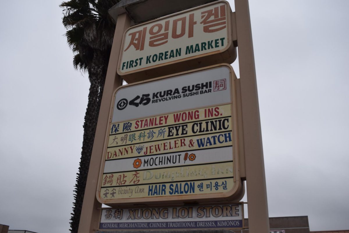 The Convoy District is home to many Asian businesses. Even if the Korean supermarket Woo Chee Chong (First Korean Market) no longer exists, their faded sign in one of the lots demonstrates many businesses’ lasting presence in Convoy.