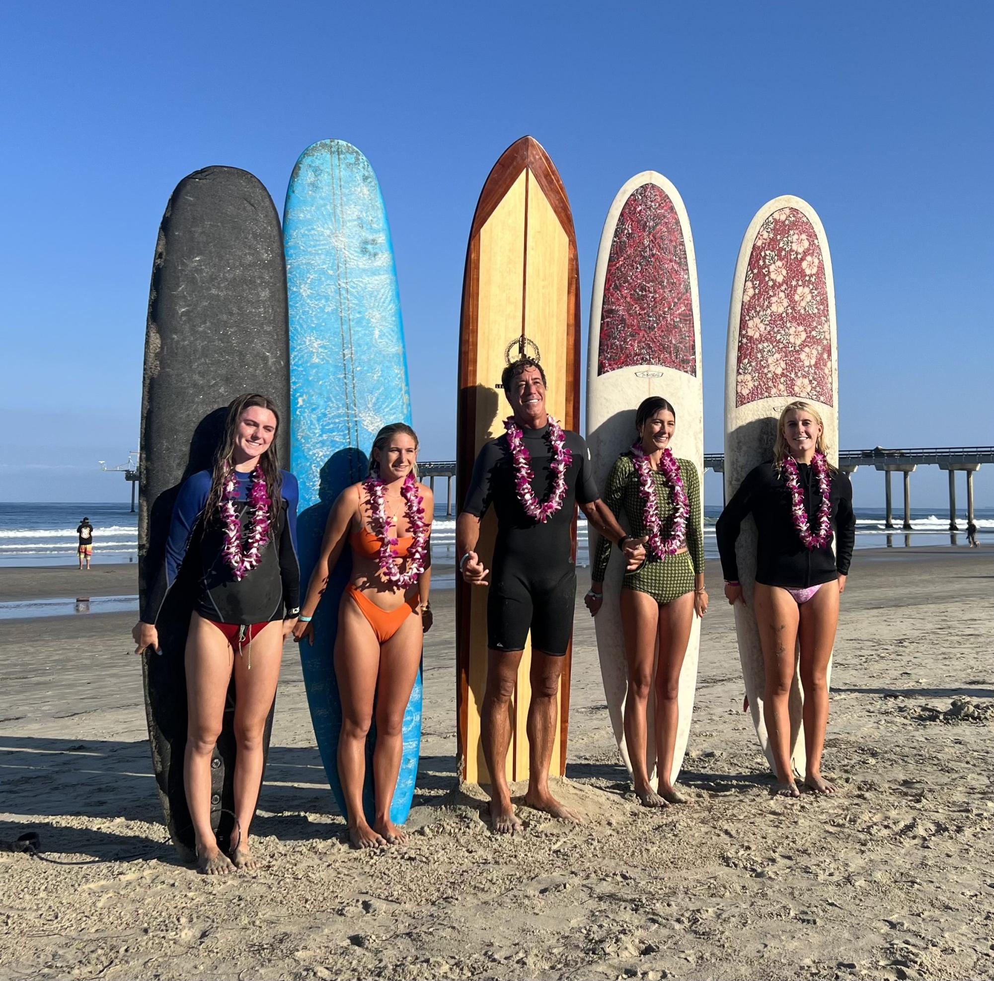 Sydney Hagan (‘25), Maile Gaardner (‘19), Bishop's parent and surfing legend Jon Roseman, Helena Roseman (‘21), and Grace Steinmer (‘25) made up one of the 16 teams that competed in this year’s Luau and Legends of Surfing Invitational.