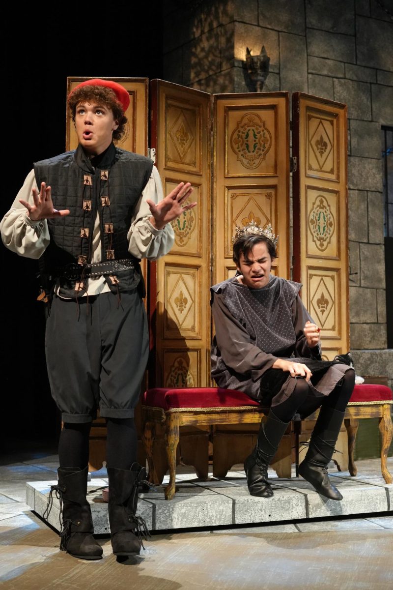 Prince John, portrayed by Naveen Hernandez (‘26), laments to the Sheriff of Nottingham, played by James O’Brien (‘26). “At his core, Prince John is motivated by a desire to be better than his brother Richard,” Naveen explained. “But he is also motivated by immense greed and just plain malevolence.”