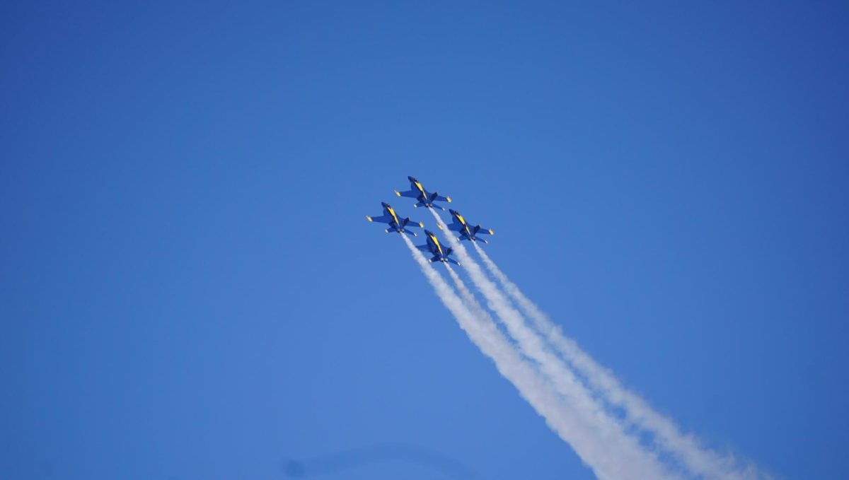 In their classic diamond formation, the Blue Angels climbed higher and higher in the sky, nearing a 90-degree angle to the ground. 