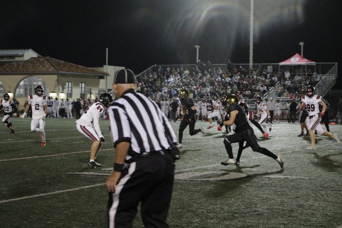 As  rain started to sprinkle on the audience, cameras, and field—players upped their intensity, as if awakened by the cold water. 