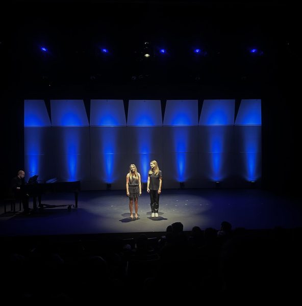 Lainie Beamer (‘25) and Riley Brunson (‘25) sing “I Will Never Leave You” from the musical Sideshow. Choir Director Dr. Christine Micu mentioned that the song “features their beautiful soprano voices and all the work they have put into refining singing technique for the past four years.”