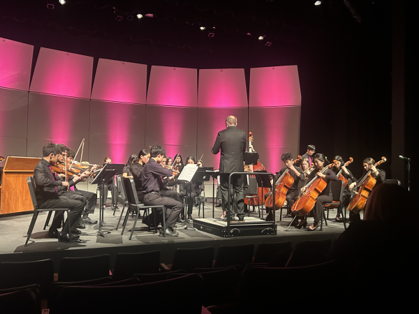 Conductor and Instrumental Music instructor Mr. Robert Anderson leads the Bishop’s chamber orchestra during the final leg of the concert.