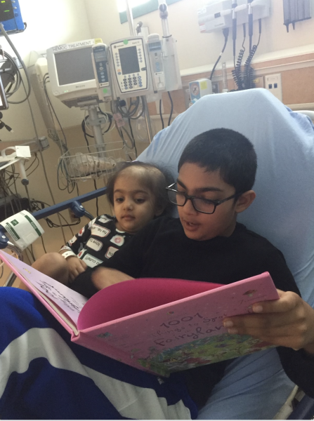 Amaan Khan (‘27), reading to his sister, Zainab, during one of his visits to the hospital while she was battling Acute lymphoblastic leukemia (ALL) at the age of 3. 
