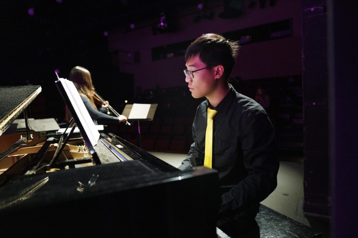 Caleb Tang (‘26) played the piano to accompany Leia Park’s (‘30) Casadesus’s viola concerto. 