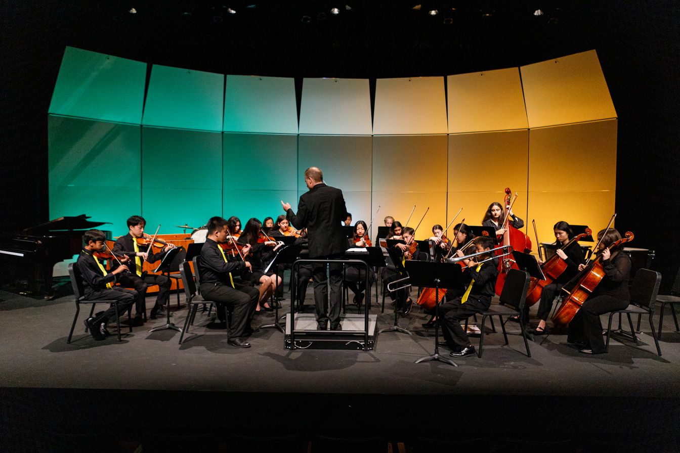 Instrumental Teacher and Orchestra Conductor Mr. Robert Anderson gave the powerful downbeats for the Bishop’s Middle School Orchestra during dress rehearsal. Always looking professional! 
