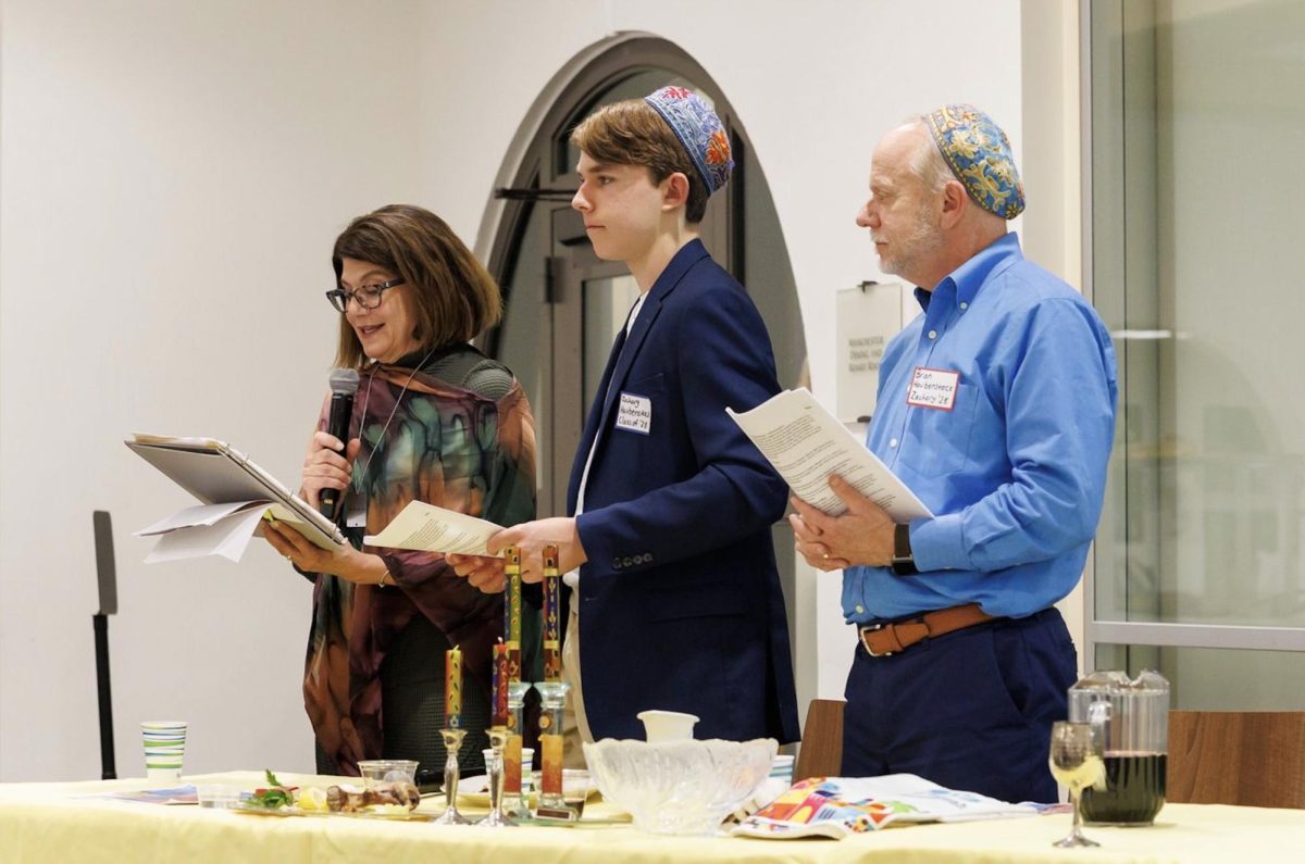 Zachary Haubenstock (‘28) and his parents Mrs. Lori Shearer and Mr. Brian Haubenstock helped lead the guided Seder dinner for the Bishop’s community. 