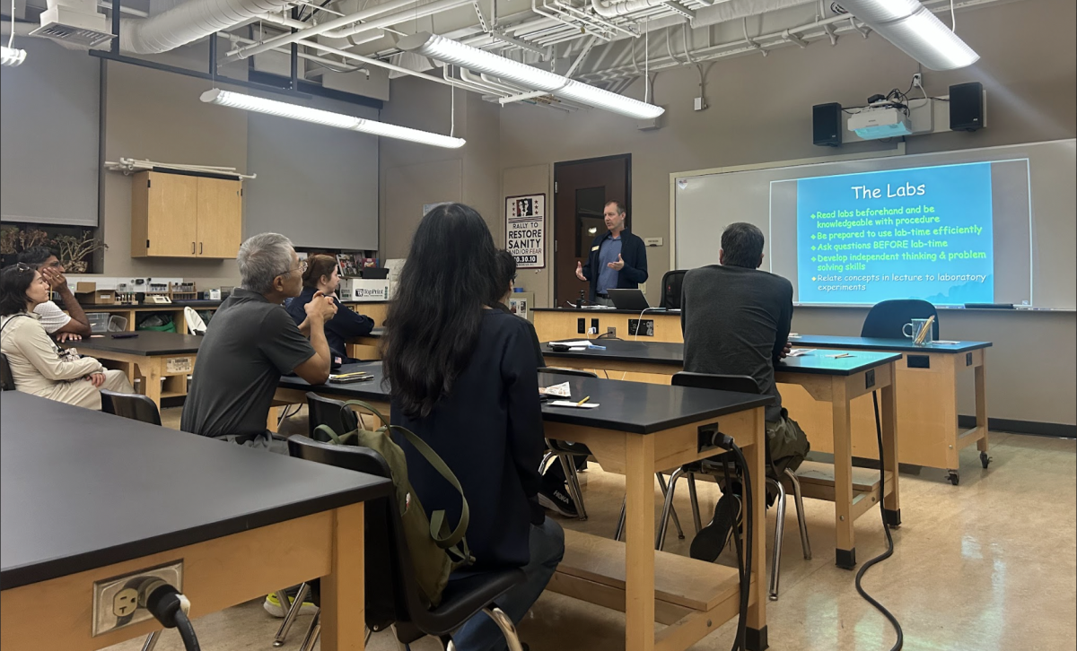 In Mr. Benjamin Duehr's period 6 class, he told the parents about the students' first big lab: the Enzyme Lab. Students tracked the enzyme catalase, which is responsible for speeding up the decomposition of hydrogen peroxide into water and oxygen gas.