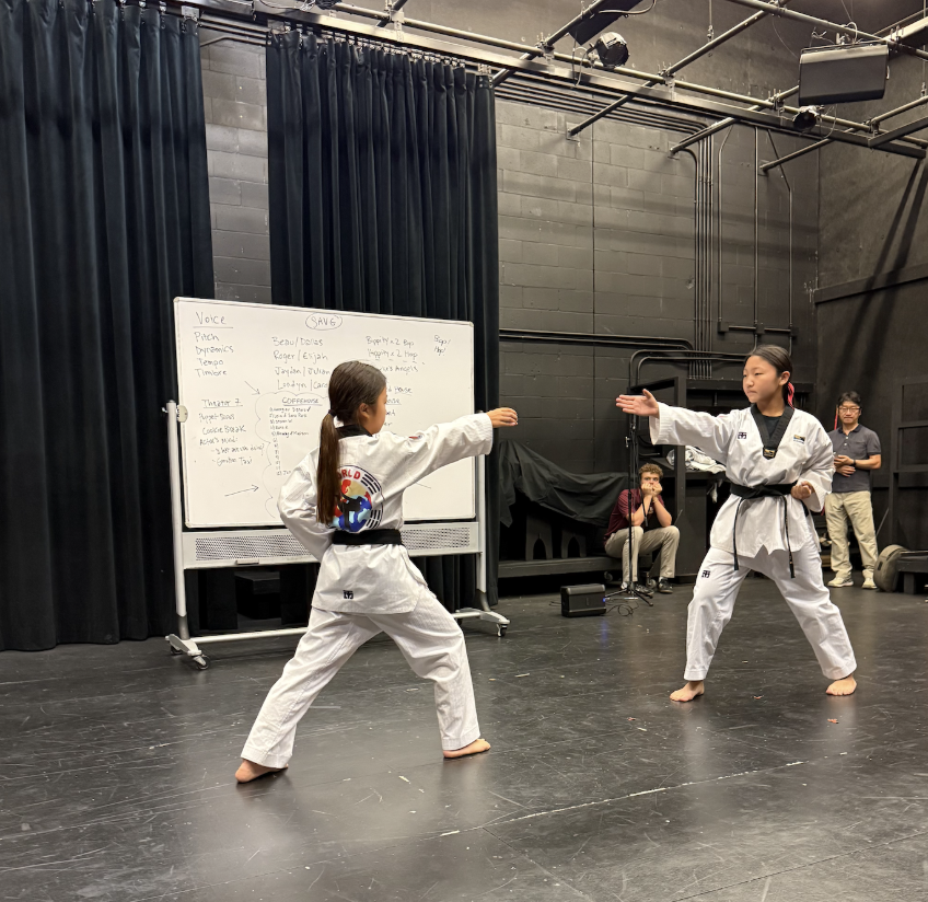 Leia (‘30) and Sara Park (‘32) ended their combative performance with a yell known as a kiyap. Leia explained with a proud smile, “I realized this when I was little, but not many people see taekwondo every day. For me, it’s a daily occurrence, so it feels very normal…when I do [a performance] in public, everyone’s like ‘Wow, that’s really cool’. So it always reminds me how this isn’t a normal thing in other people’s lives and I think it’s really cool that I can share that.” 