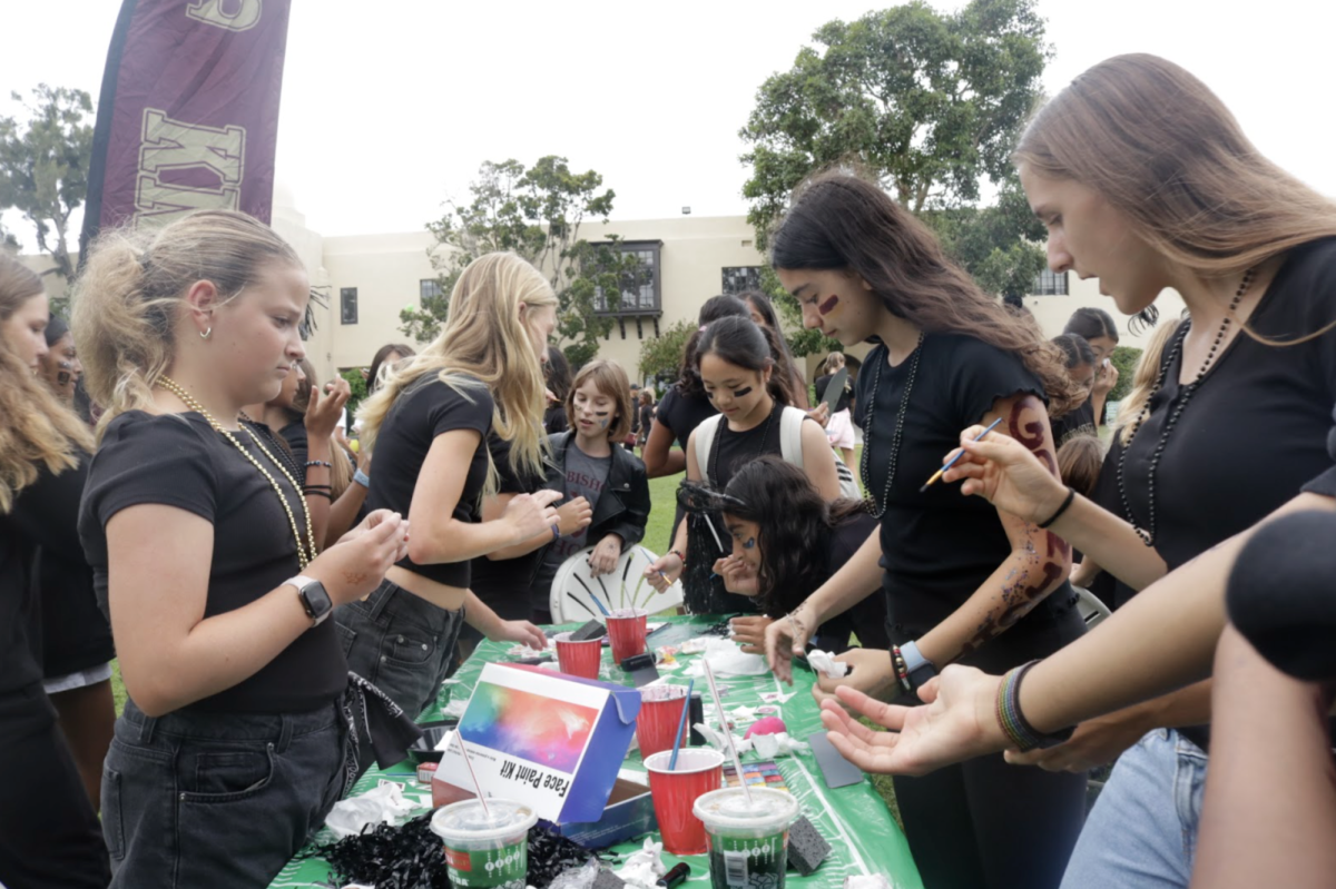 At the face painting station, Olympia Georgiou (‘30), trying to find the color she needed, said her favorite part of Bish Bowl was “doing the quad activities and the barbecue,” which featured burgers, chips, and Otter Pops this year. 