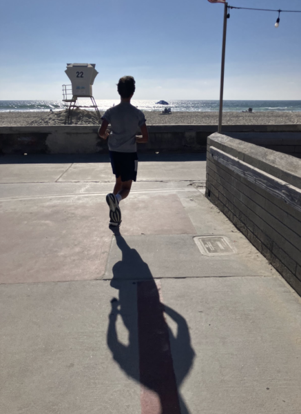 Tejas Gluth (‘28) runs toward the ocean in Pacific Beach at mile 6.5 of his weekly 10-mile long run, building endurance so his three mile races feel easy. He has run cross country since sixth grade and continues his passion seriously. Tejas still takes time to enjoy running and appreciates his teammates who are less intense because “It just makes running more fun.”