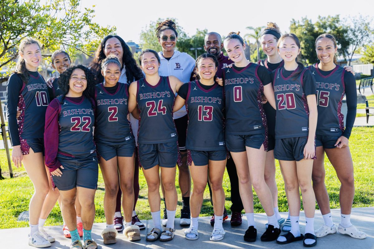 The Varsity Girl’s Basketball team posed for a photo after winning a game at the Granite Hills Thanksgiving showdown. Captains Margo Leong, Ayla Johnson, and Kamaili Lei Lasua are pictured on the far left, far right, and in the middle next to Coach P, respectively. 