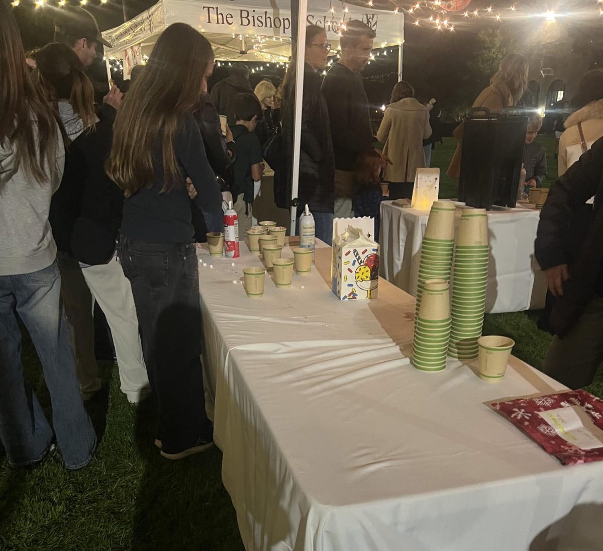 The hot cocoa and sweet treat stands were bustling with excitement. “Just looking at the event, I can tell everybody’s happy,” Jonathan Hendrickson, a volunteer at one of the sweets stands, remarked.