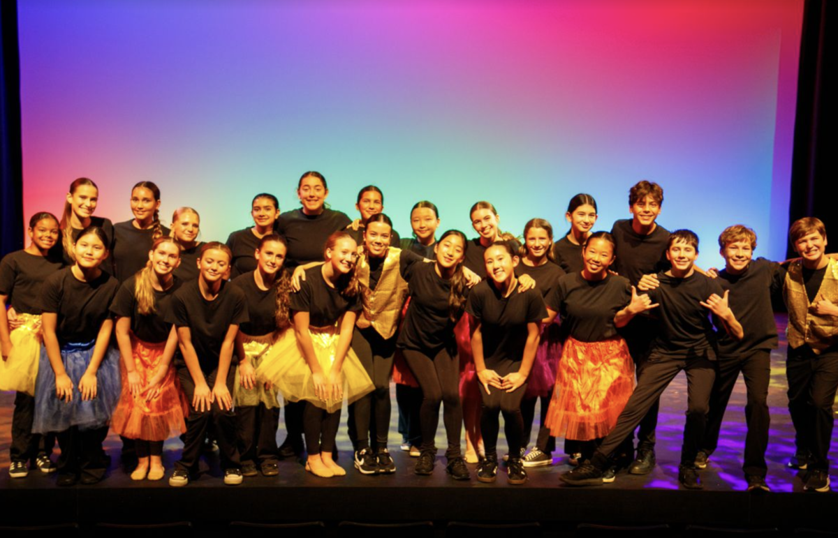 Coach Korneychuk shared, “What I love about MT8 ever since I started working here is that it has garnered a lot of interest from a diverse group of students.” The group's ability to stand together for one last picture before leaving the stage shows how even though they may not be from the same group they are all able to still come together and perform as one unit, continuing the long-lasting MT8 tradition. 
