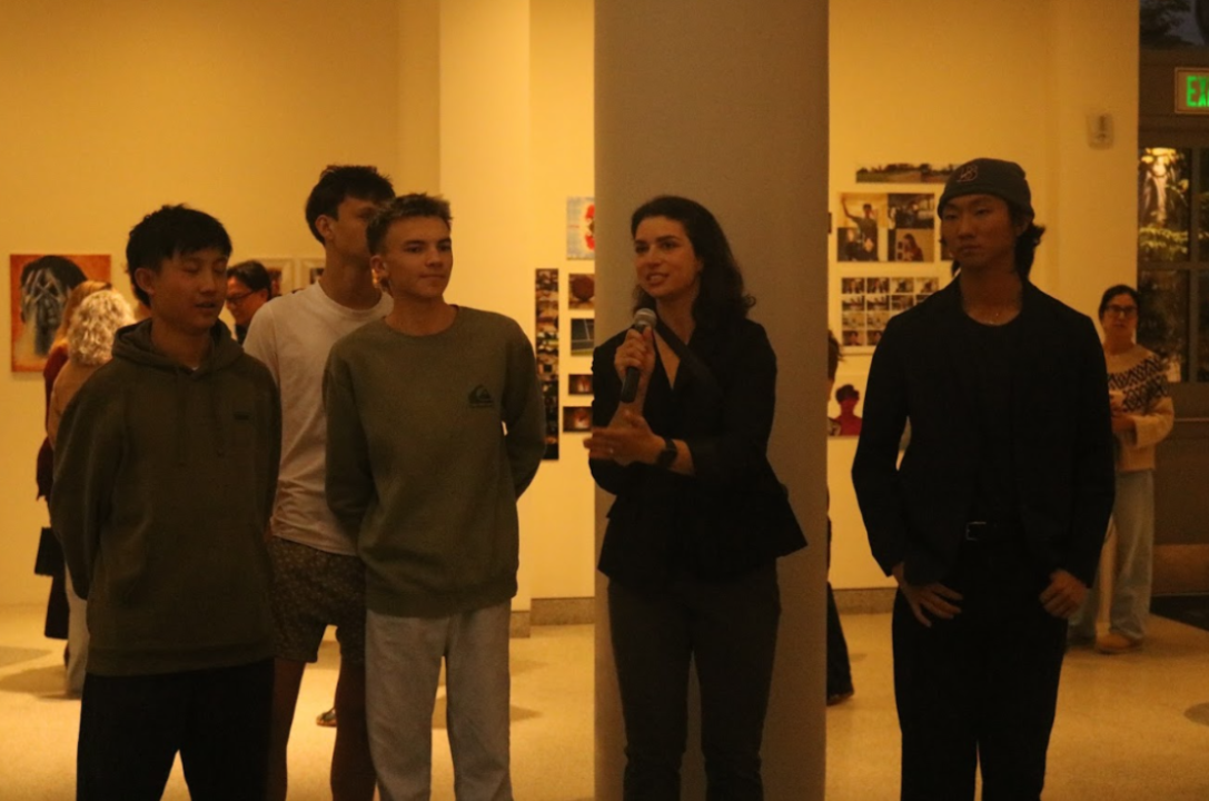 Digital Media teacher Ms. Emily Grenader, pictured with microphone, thanked the museum on behalf of The Bishop’s School. “It was really neat to have a show together with two other high schools,” she reflected.