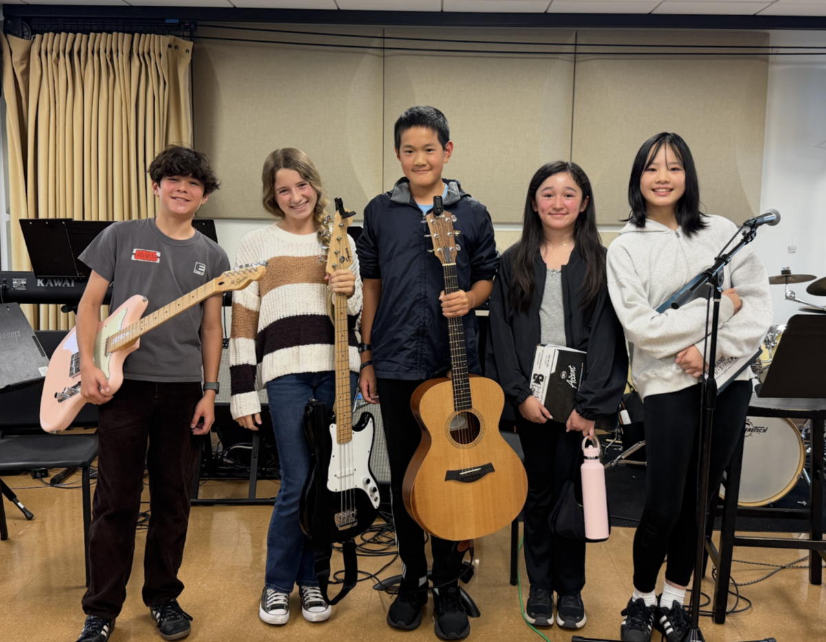 Many students who join Bishop’s Rocks aim to learn new instruments, including many performers that afternoon. “You can learn an instrument even if you don’t know anything, and it’s a really fun way to practice,” Clara Stone (‘30) said. Left to right: Adam Shteremberg (‘32), Clara Stone (‘30), Roger Sun (‘31), Elle Ritter (‘32), and Eva Xie (‘30).