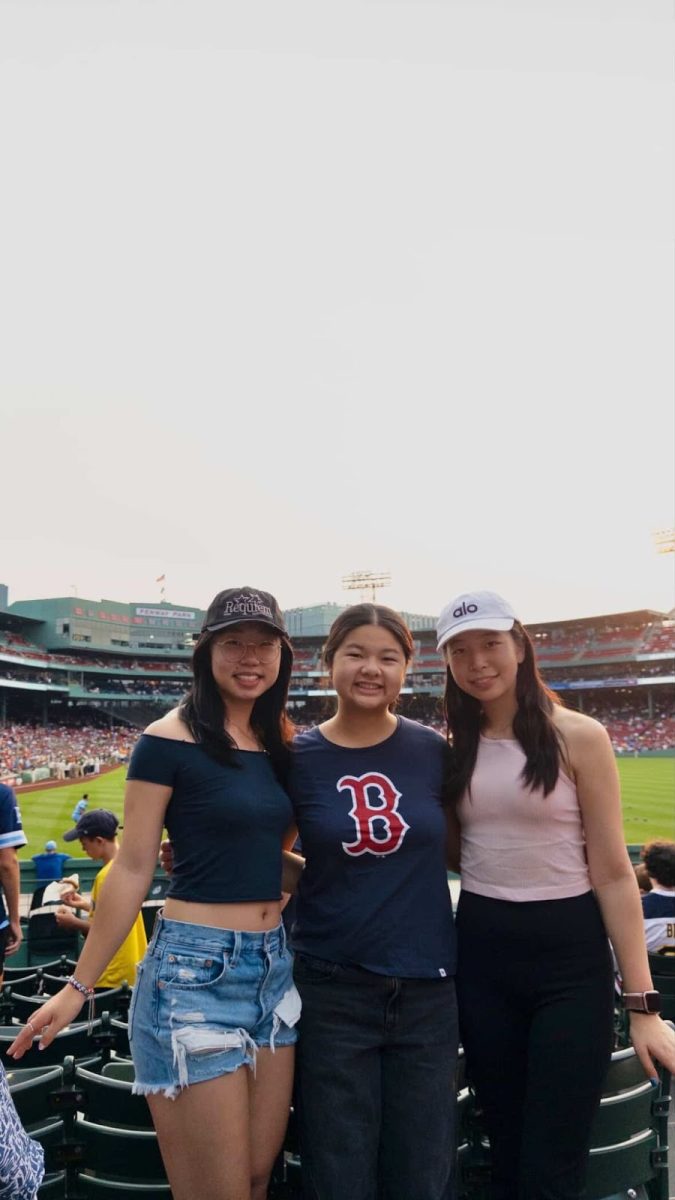 From left to right, Grace Yao (‘26), Sydney Mafong (‘26), and Kailin Xuan (‘26) attended a Red Sox baseball game in Boston during their time at Boston University’s Research in Science & Engineering (BU RISE) program.