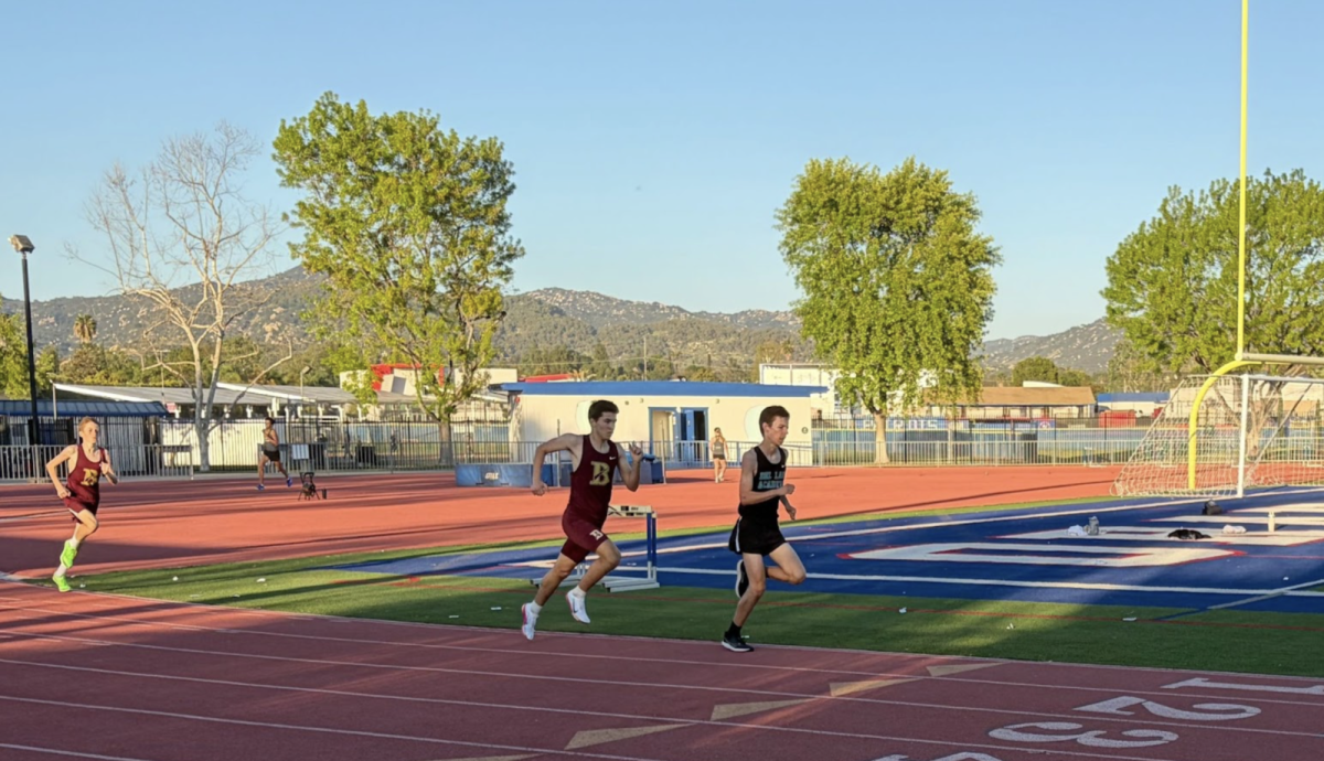 Kellan McDougal (‘27) (left) led his teammates in the 800-meter run, finishing with a time of 2:22.51. Kellan said he was less focused on time, and more so on “placement [and] really getting out fast and competing with all the other runners.”