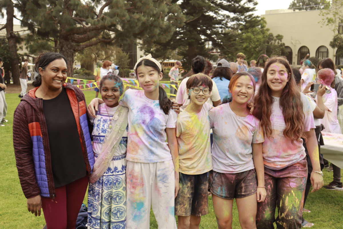 From left to right, Ms. Sonia Mahabir-Graham, Leah Graham (‘30), Sophie Duan (‘30), Sydney Byun (‘30), Leia Park (‘30), and Ayelet Ron (‘30) pose with their newly-colored clothing. Afterwards, Sophie and Sydney voiced their appreciation for such a colorful and exciting event. Sophie pointed out that, with everyone “throwing powder at each other,” the event really was a perfect time for “bonding.”