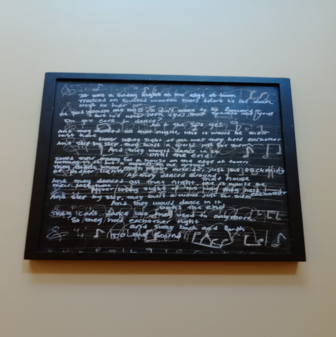 “This is a song I wrote,” Stella McGuiness (‘26) explained, “It was originally just a chalkboard with random notes I made up. It wasn't actually anything, and I hadn't even looked at it since I made it in freshman year. This year I finished it. I was like, ‘Wait, what if I just write one of my songs over this?’” The song she wrote was about aging, meditating on being a graduating senior. 