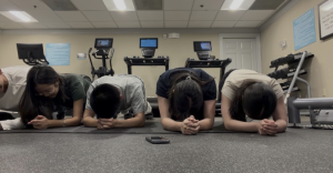 The night before the competition, team members Michael Sun (‘28), Claire Li (‘28), Adam Fang (‘27), Isabelle Qiao (‘29), and Tracie Liu (‘28) participated in a group plank. According to Isabelle, they had a pre-competition workout to “get buff to intimidate our opponents the next day.”